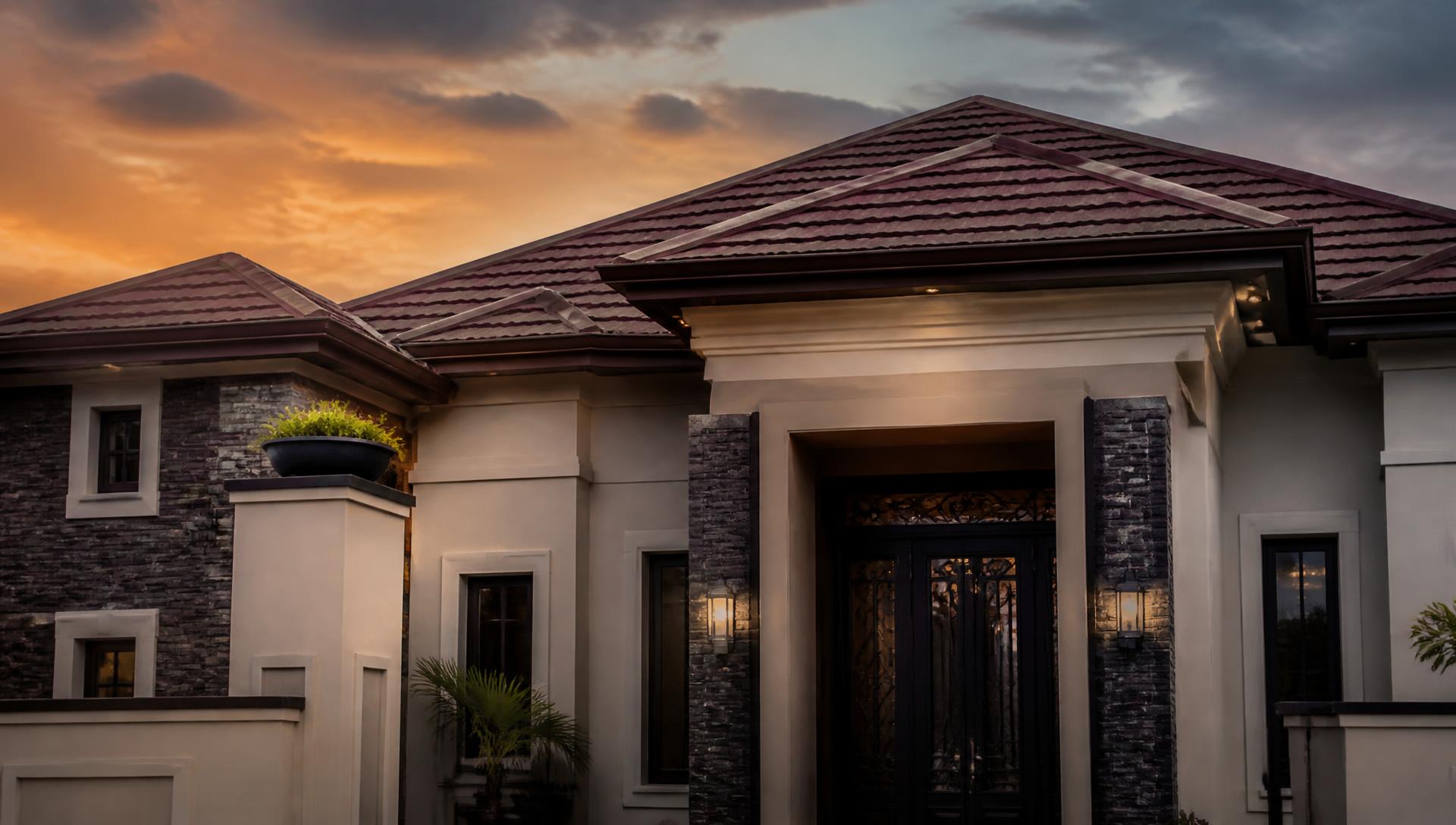Modern Nigerian home with stone-coated roof tiles and a premium entrance door